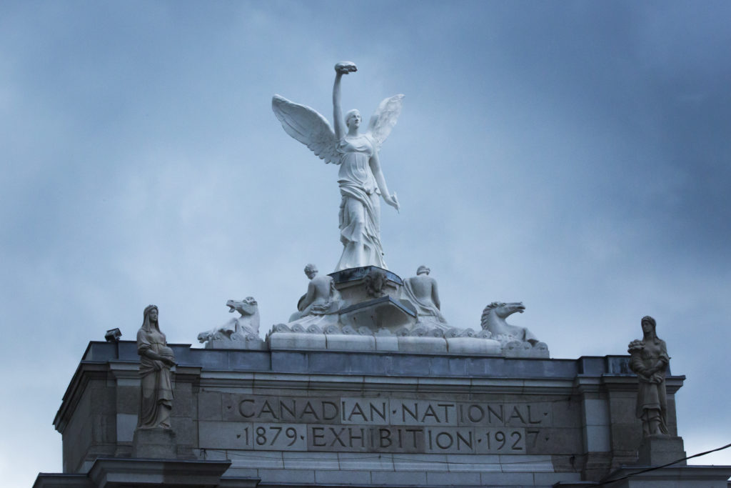 angel on top of princess gates