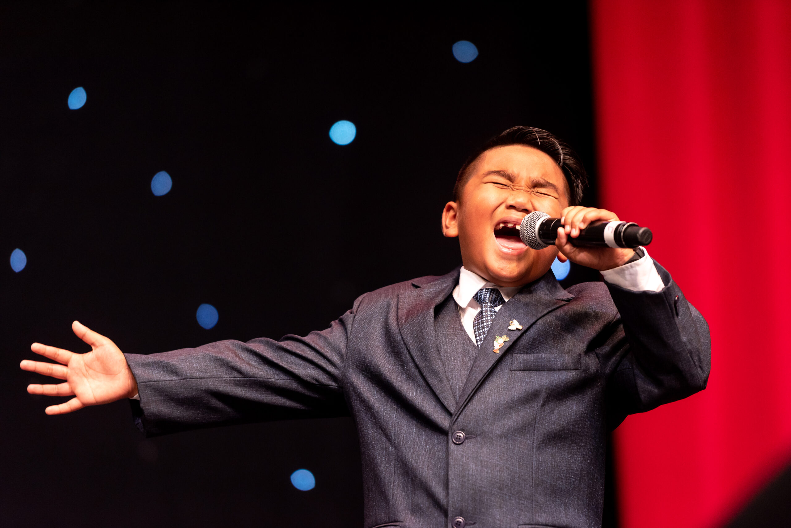 a boy singing