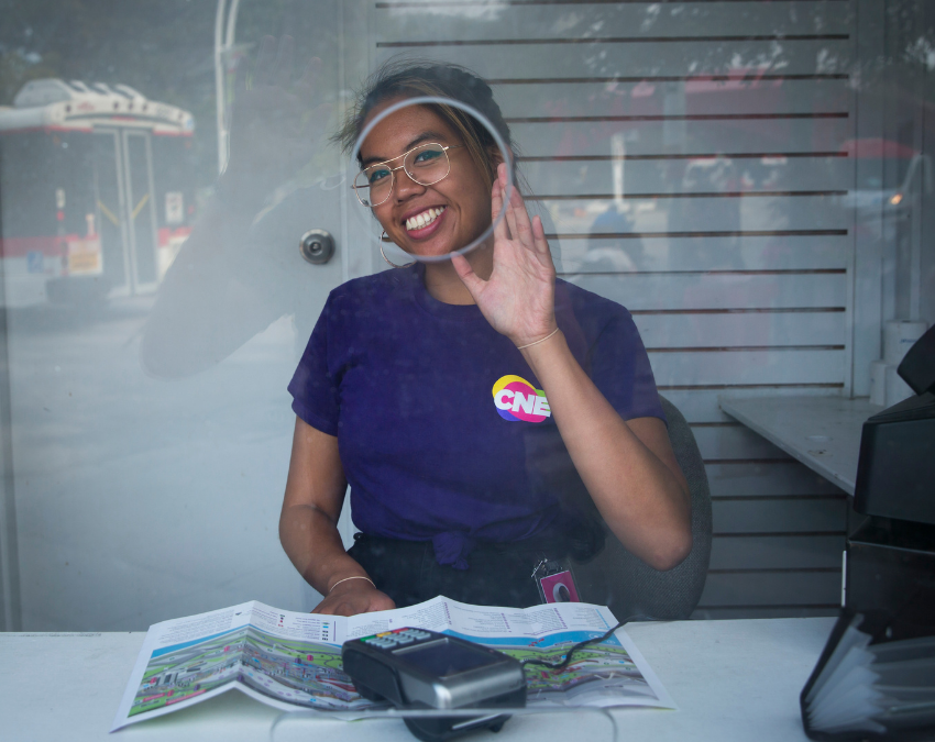 young woman working ticketing at cne