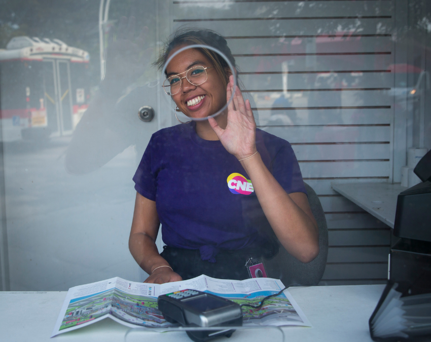 Young woman working ticketing at the CNE.