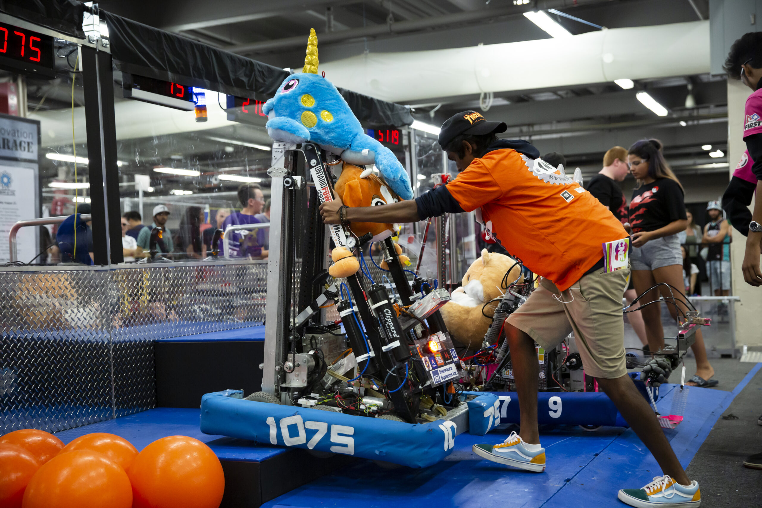 A big kid pushing a robot