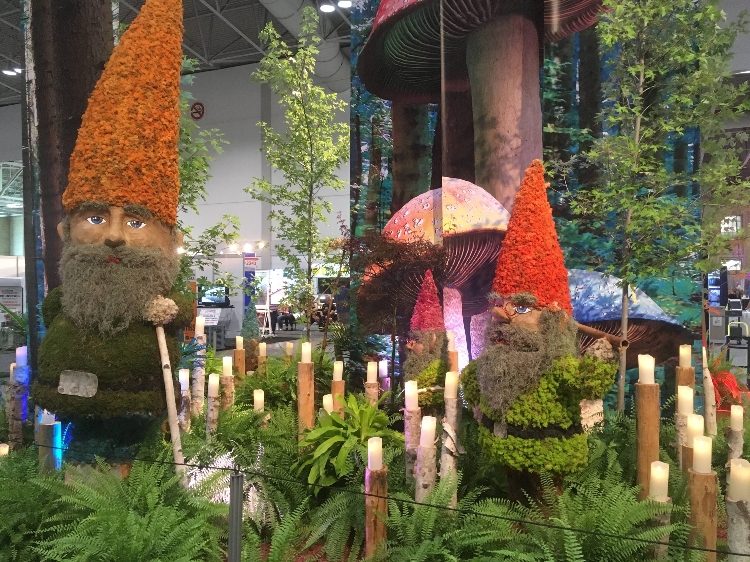 Nook of Gnomes Exhibit. Located in Heritage Court, a colouful display of gnomes and large scale woodland items are places at the entrance of the hall.
