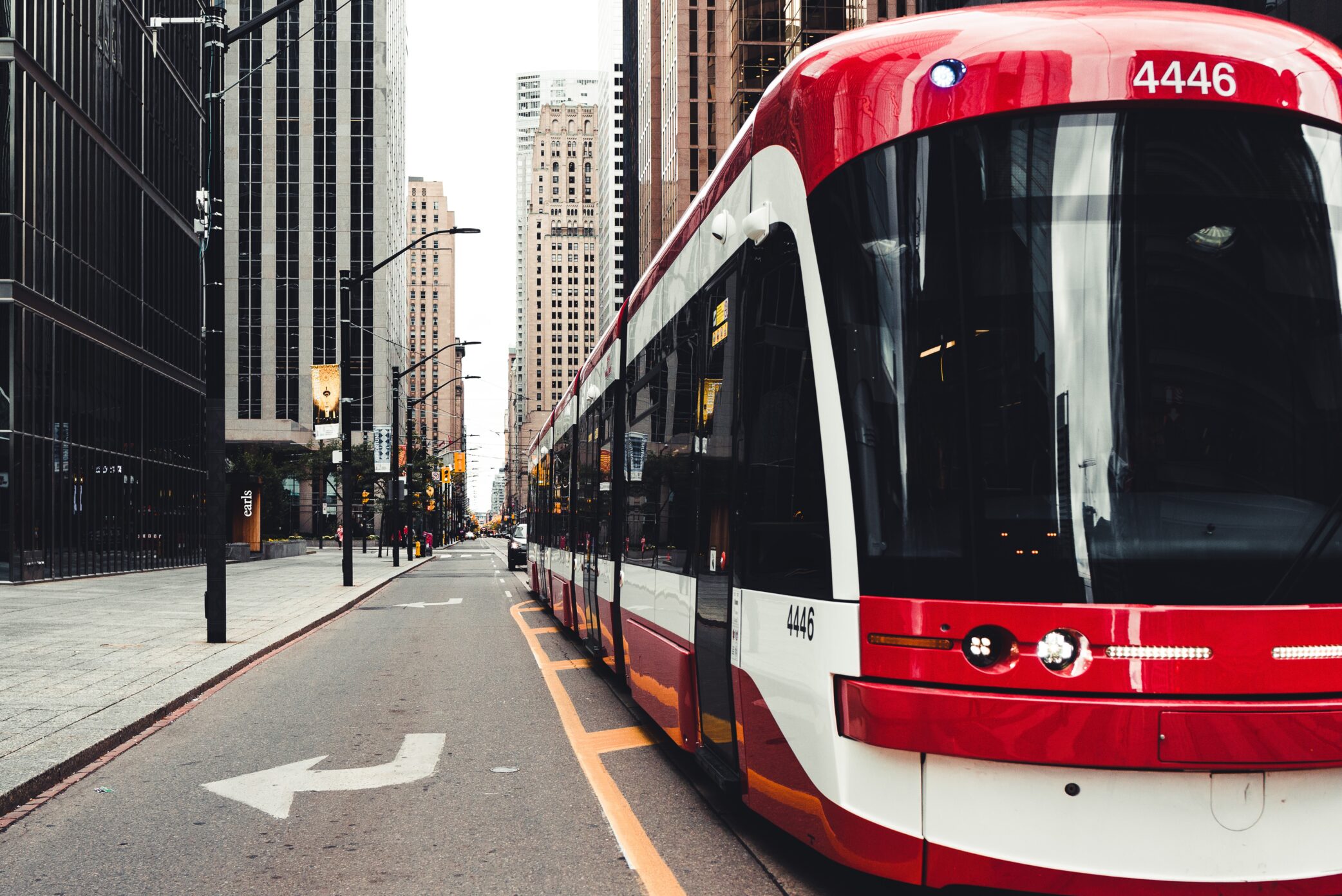 Image of a Toronto streetcar driving down a street.