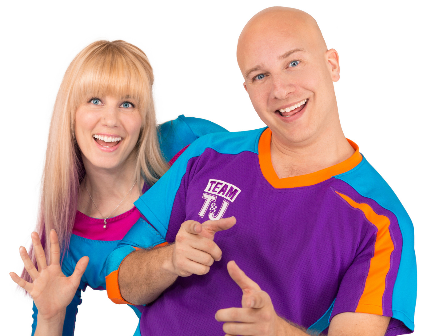 Team T&J. Image of two people wearing colourful shirts posing in front of a white background.